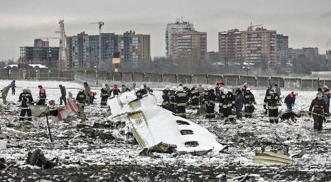 ULYKKE: Redningspersonell ved vraket av Boeing 737-800 A6-FDN, som havarerte ved Rostov-on-Don 19. mars i fjor. ULYKKE: Redningspersonell ved vraket av Boeing 737-800 A6-FDN, som havarerte ved Rostov-on-Don 19. mars i fjor.